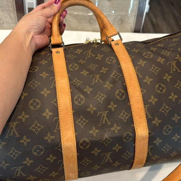 Authentic Louis Vuitton Keepal Bandolier 55 travel bag - Picture 8 of 15